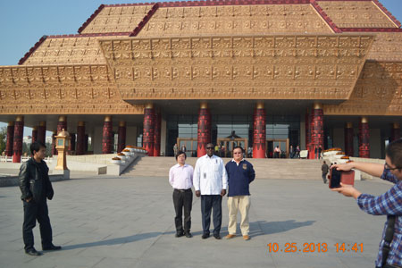 customer from Burkina Faso taking a picture at the museum of Chinese text